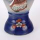 Antique ceramic vase with floral decoration, Japan, early 20th century.