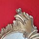 Louis XV style rocaille mirror in wood and gilded stucco