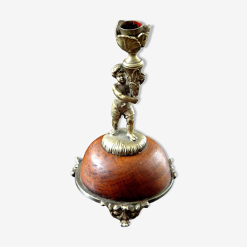 Candlestick with putti in gilded bronze XIX