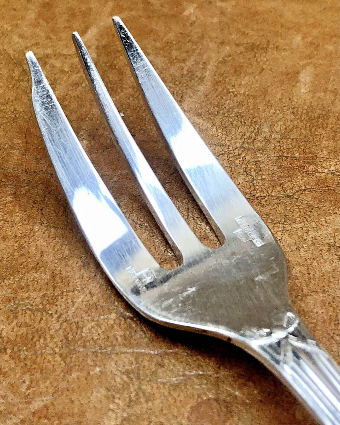 7 Christofle silver-plated oyster forks with Louis crossed ribbons