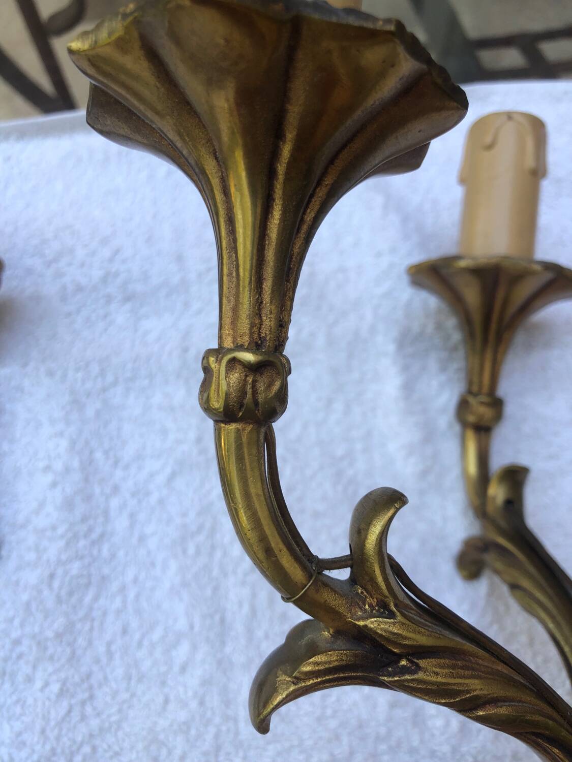 Pair of Louis XVI style bronze wall lights