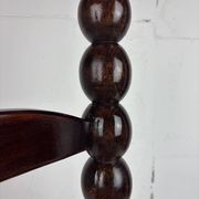Brutalist wood turned bobbin low rush chair n the style of Charles Dudouyt