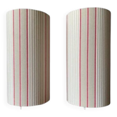 Pair of striped fabric bedside lamps.