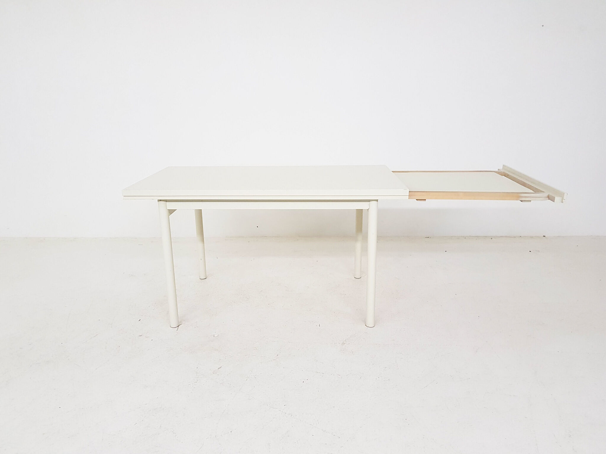 Beige extendable wooden table