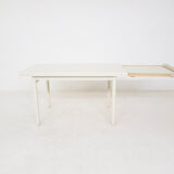 Beige extendable wooden table