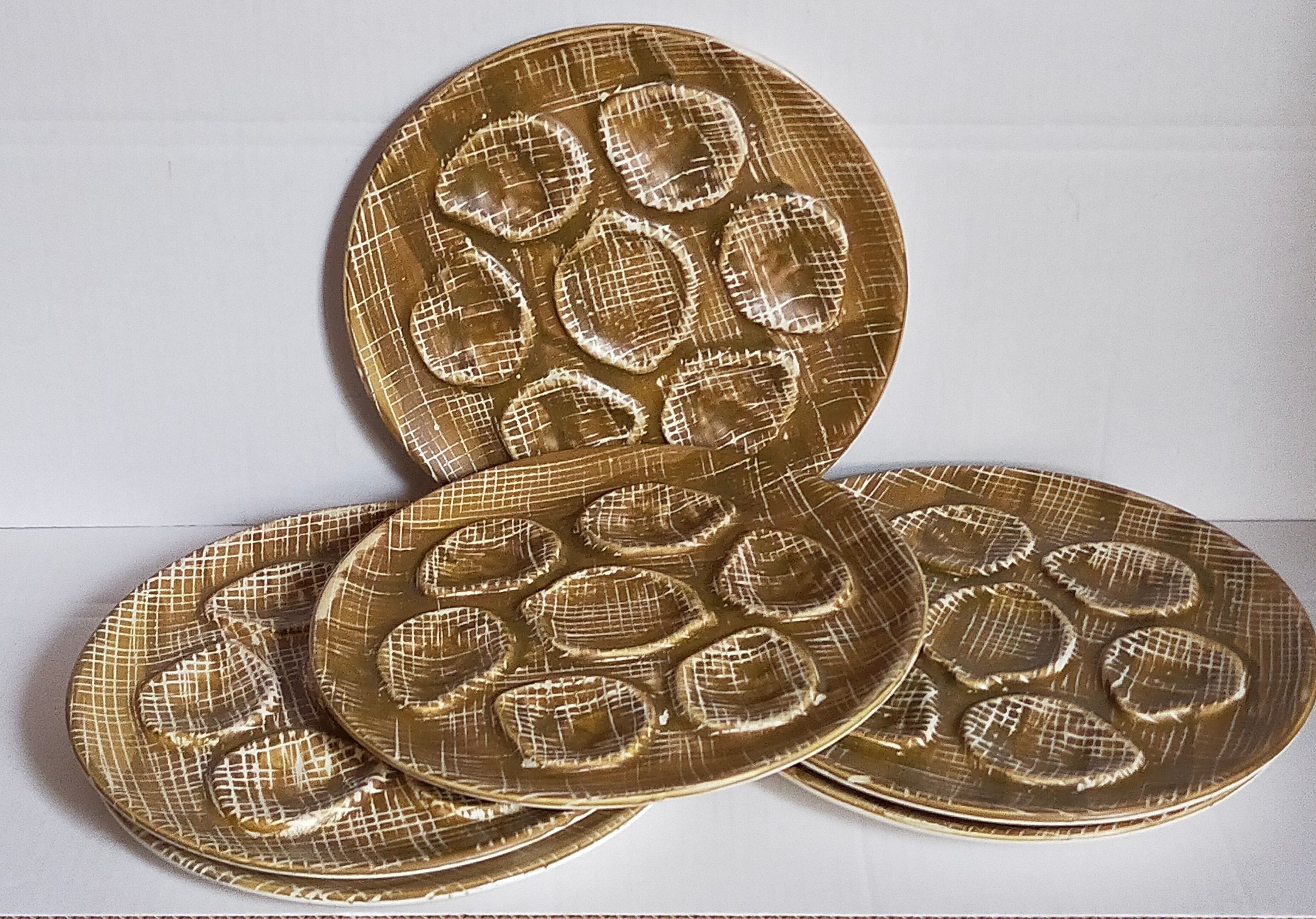 Six oyster plates earthenware with matte enamel, 50s