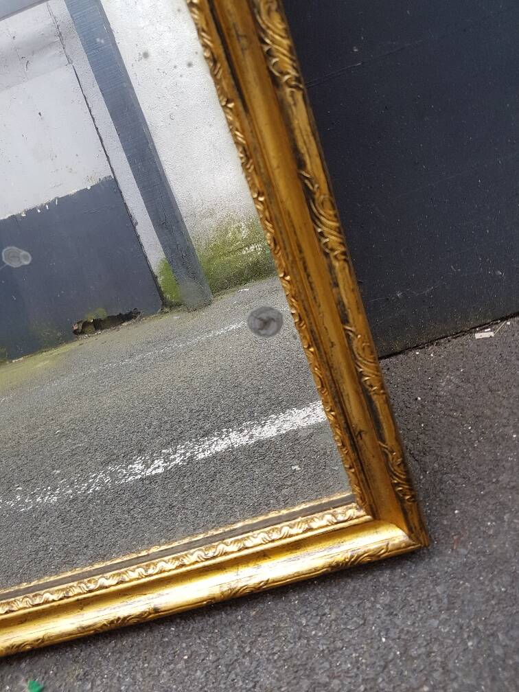 Carved wooden mirror gilded from the louis xv period