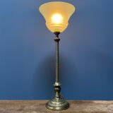 Ornate brass table lamp with mint green glass shade