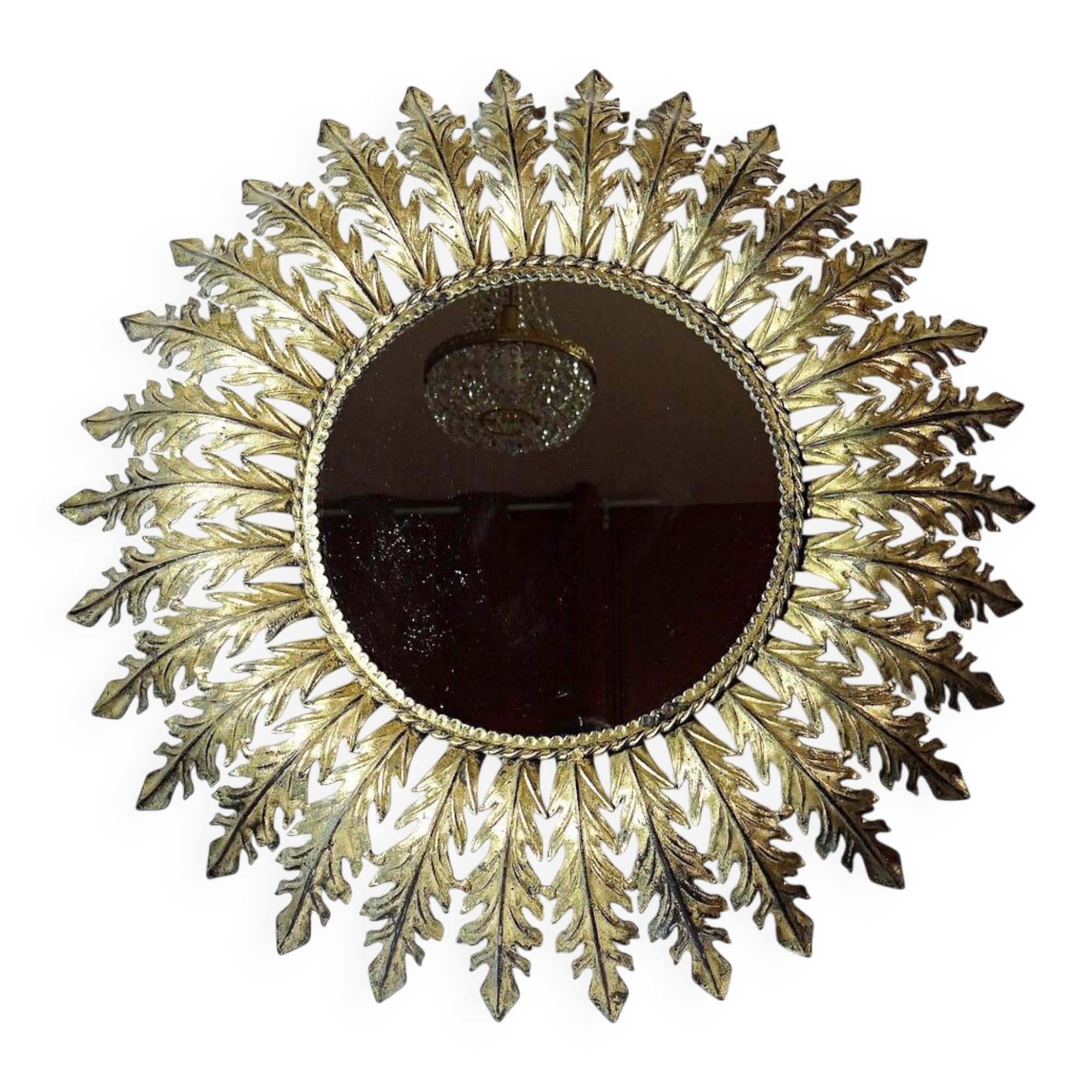 Large Italian sunburst wall mirror in gilded metal, 1960s-70s.