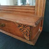 Old mirror with wooden drawer to hang art deco