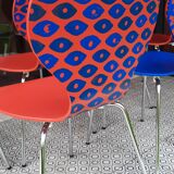 Blue and terracotta ant chairs with eye pattern