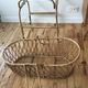 Cradle in rattan