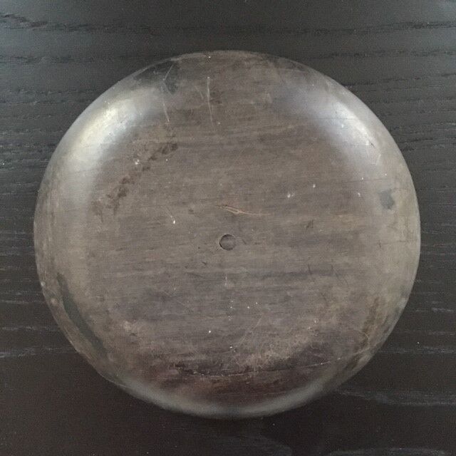 Black wood and mother-of-pearl pocket emptier