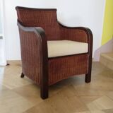 Vintage colonial-style armchair in woven rattan and exotic wood