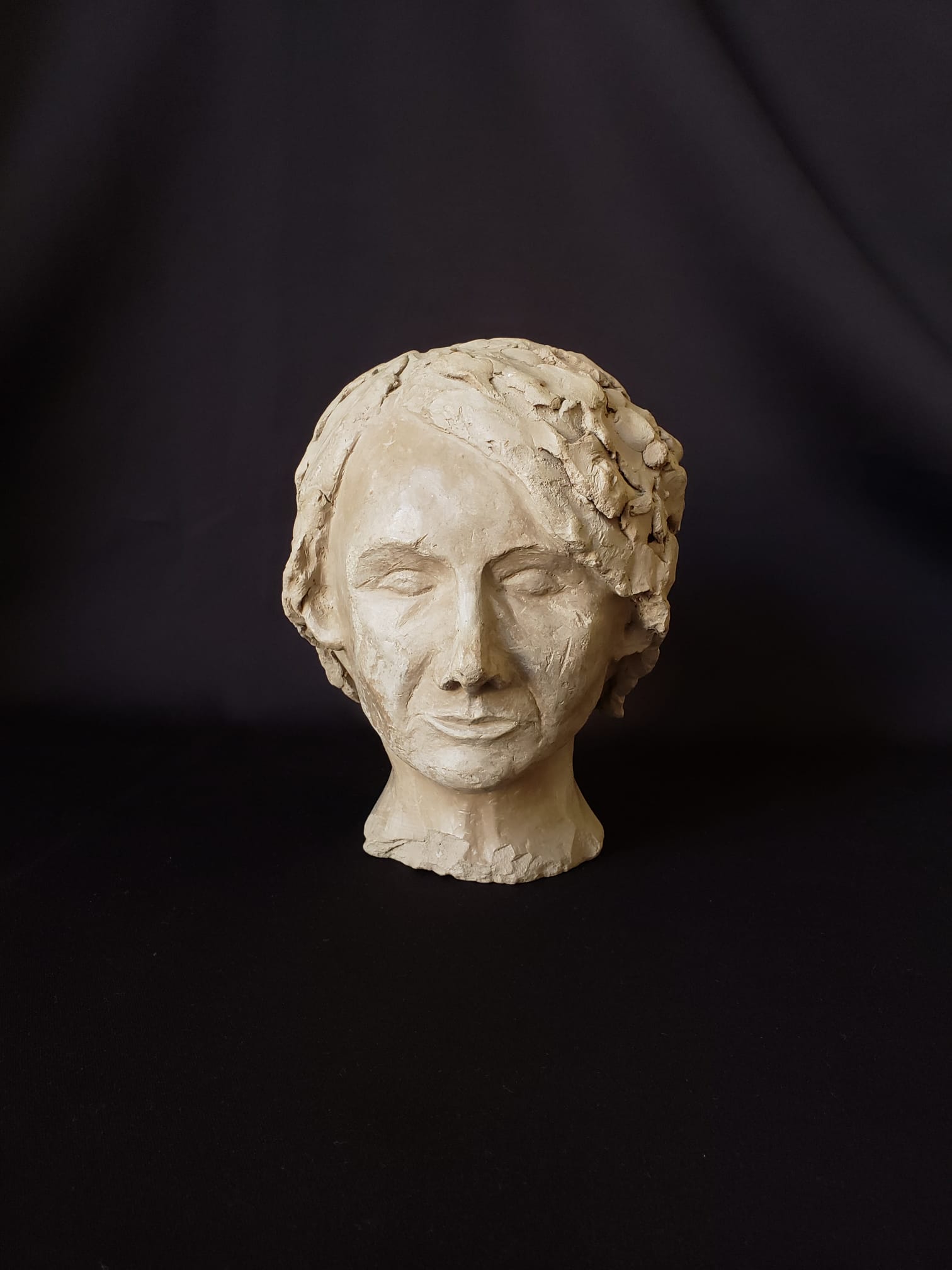 Terracotta woman's head - circa 1930