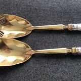 Pair of serving spoons in silver hallmark neck brace