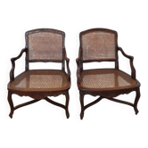 Paire de fauteuil à la reine canée, style Louis quinze en noyer.