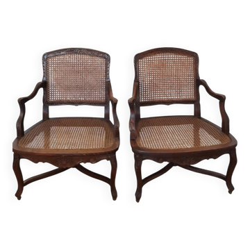 Pair of caned queen's armchairs, Louis XV style in walnut.