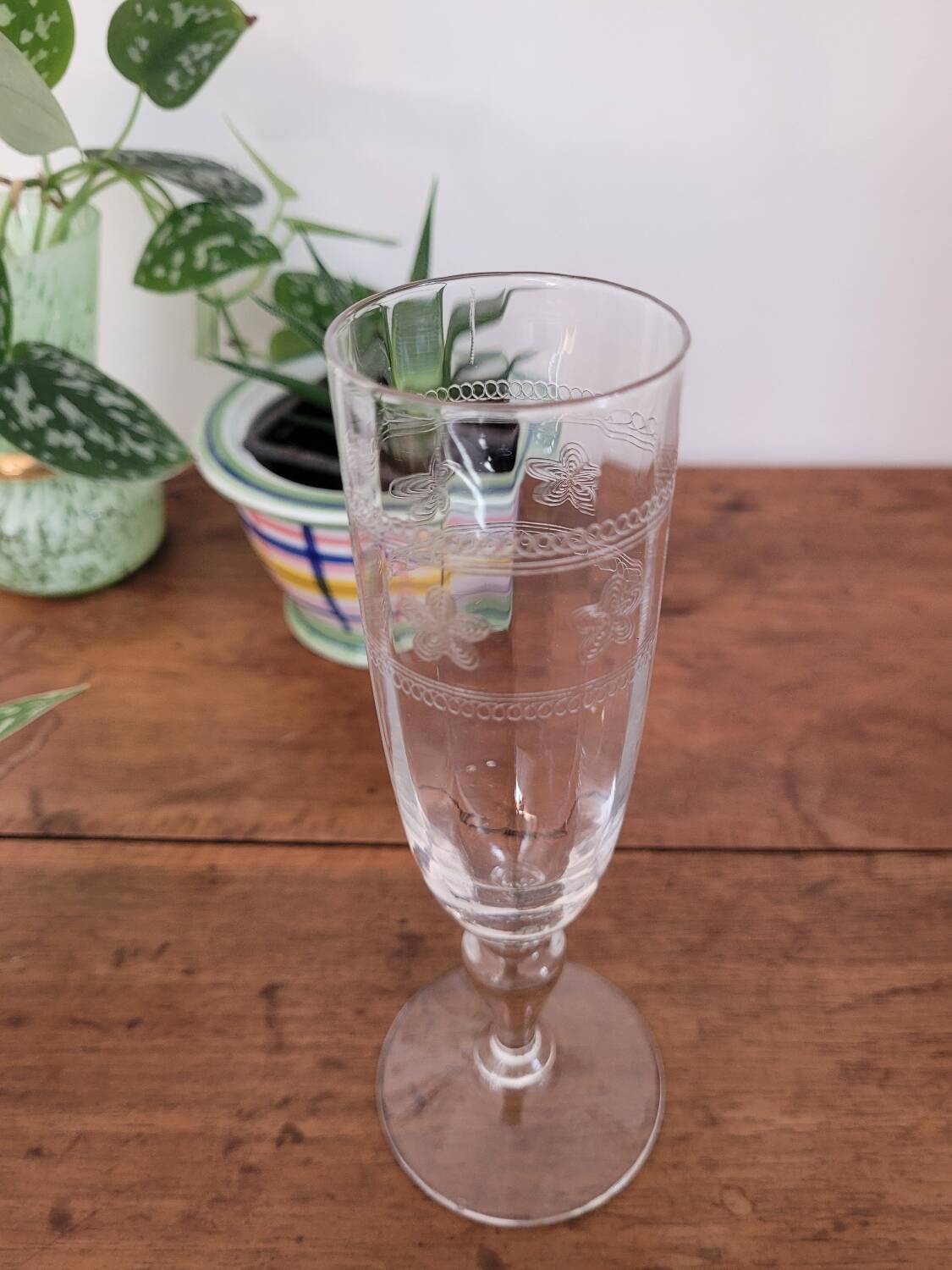 Champagne glass with floral border