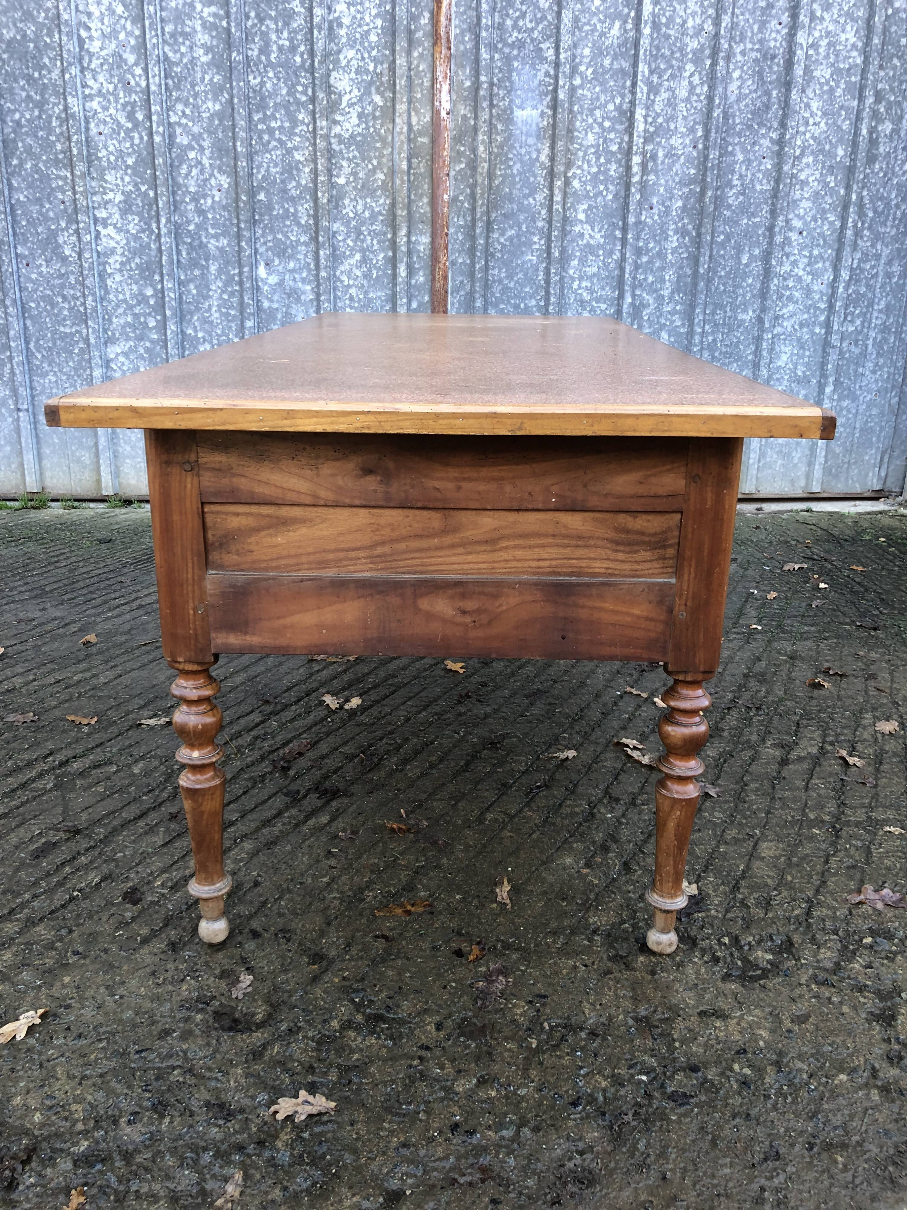 Solid cherry game table with 2 front drawers and panelled crosspieces.