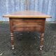 Solid cherry game table with 2 front drawers and panelled crosspieces.
