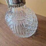 Cut crystal carafe and silver-plated metal