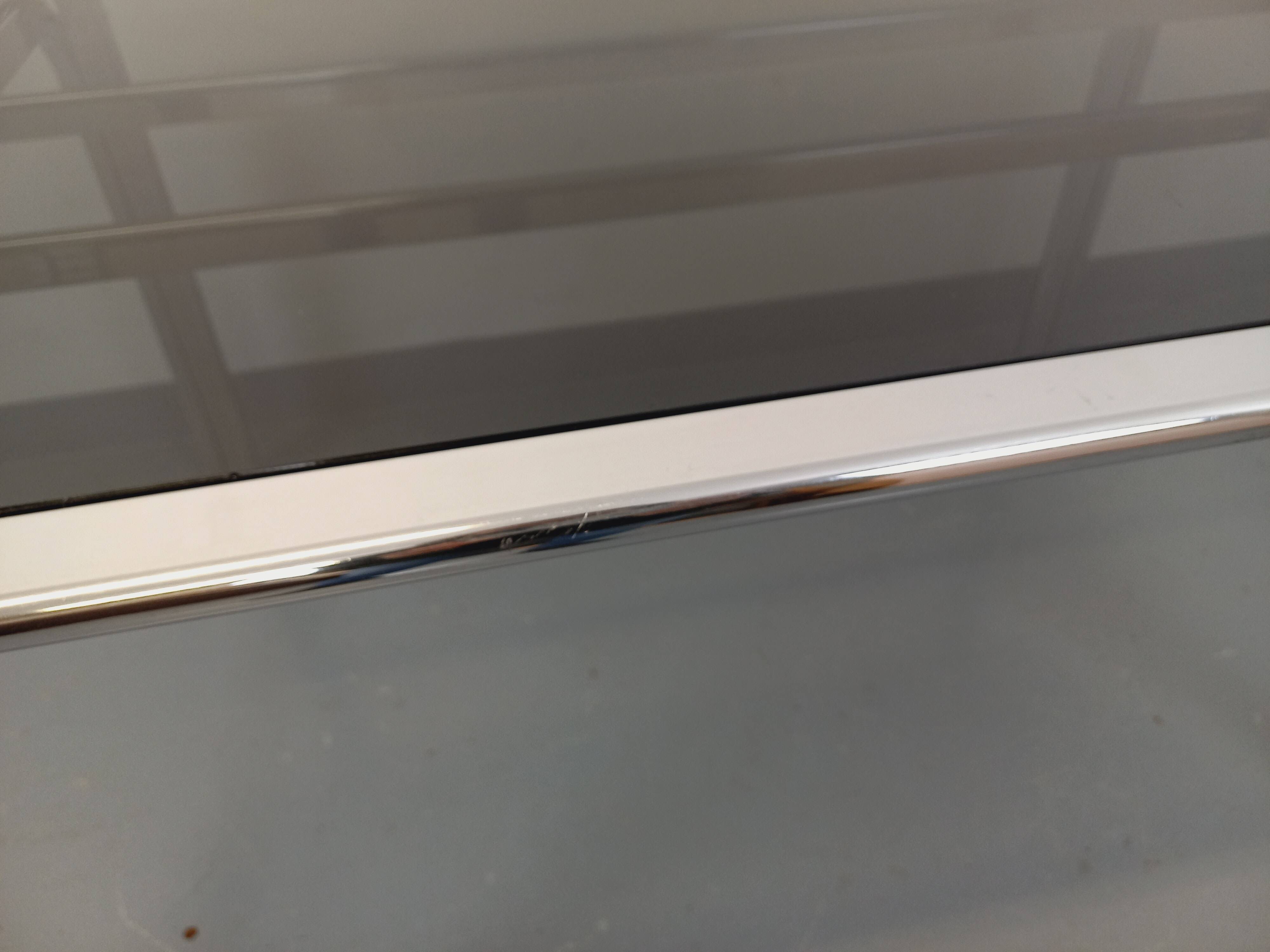 Vintage oval dining table in smoked glass and chrome metal, Space Age style.