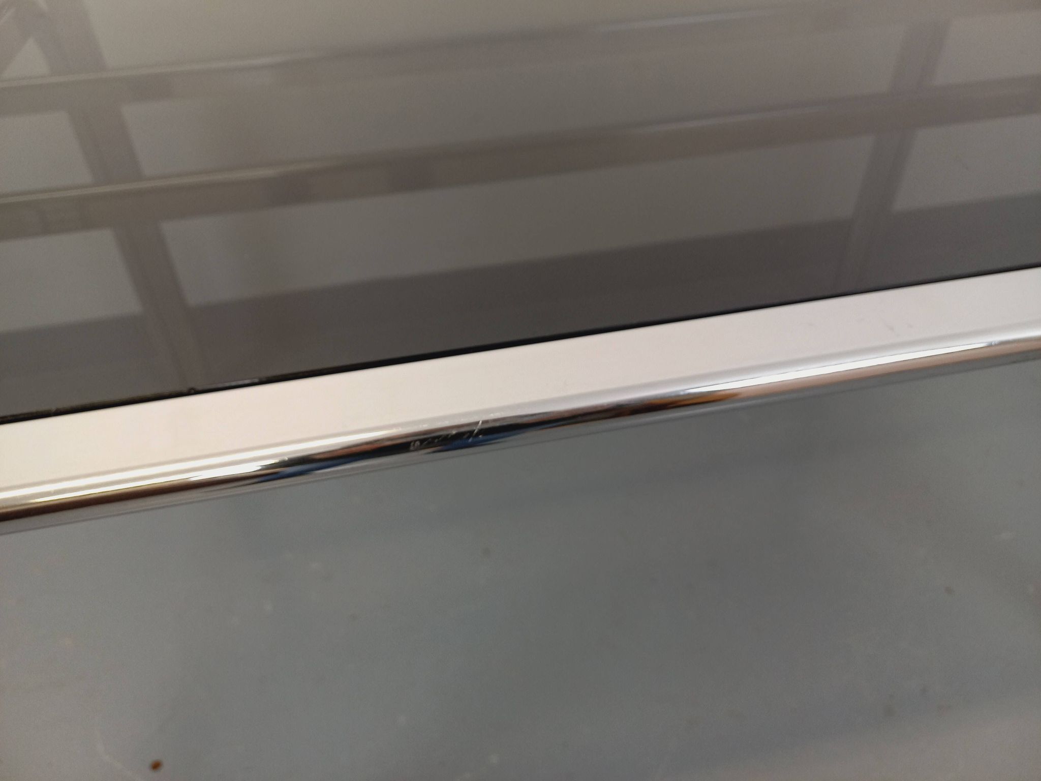 Vintage oval dining table in smoked glass and chrome metal, Space Age style.