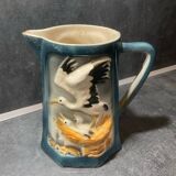 Set of stork pitchers