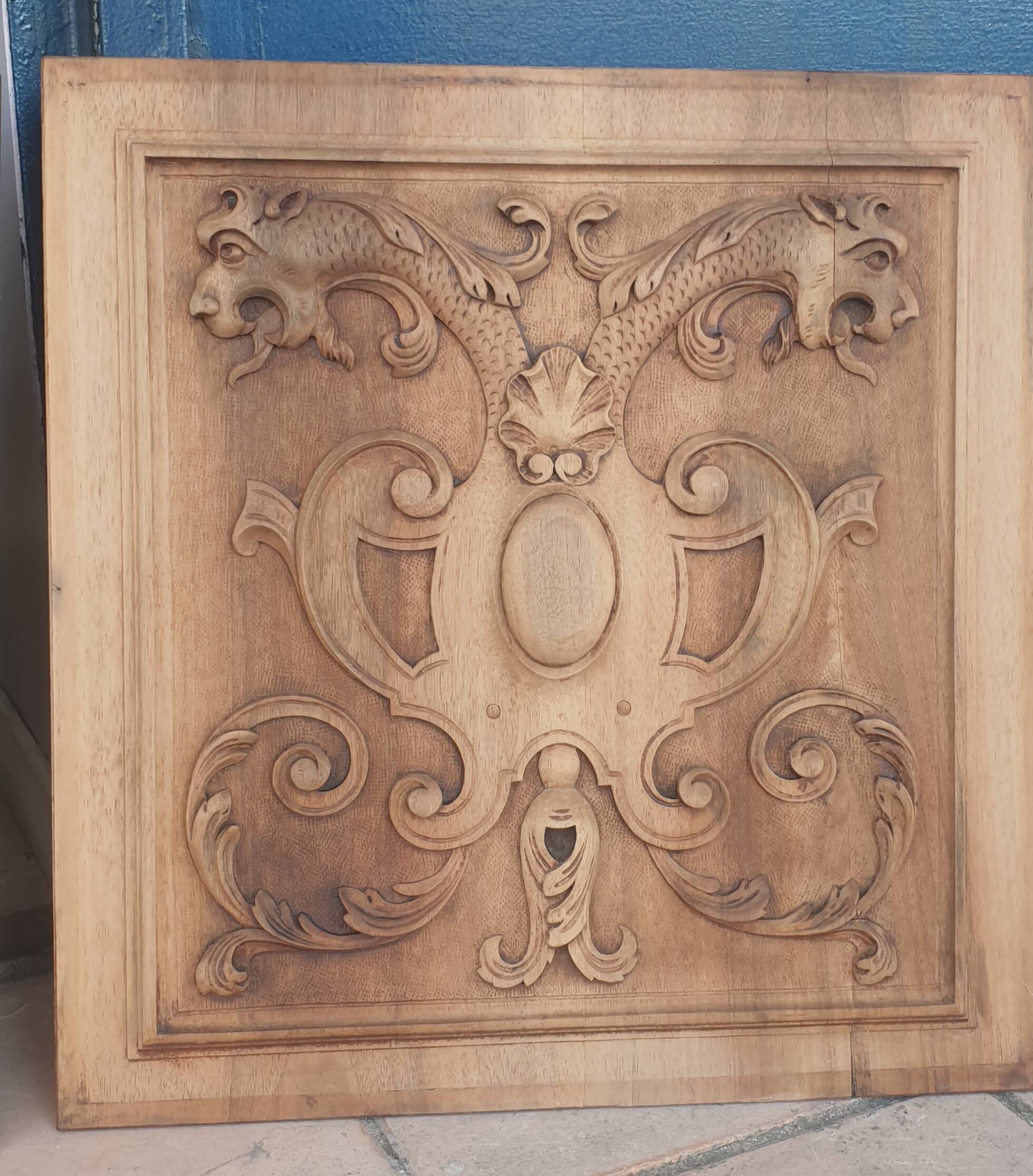 Pair of antique carved walnut panels