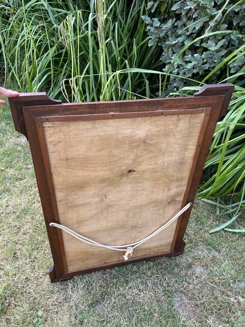 Antique carved wooden mirror