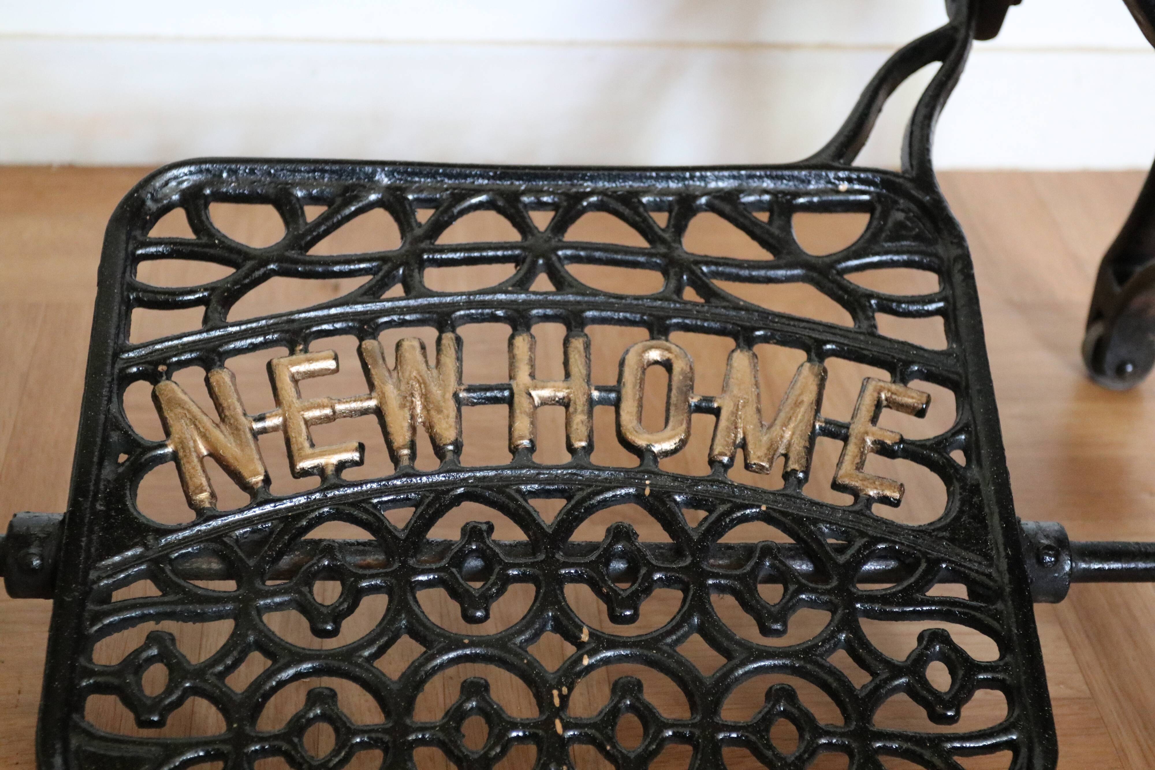 Console with new home sewing machine foot