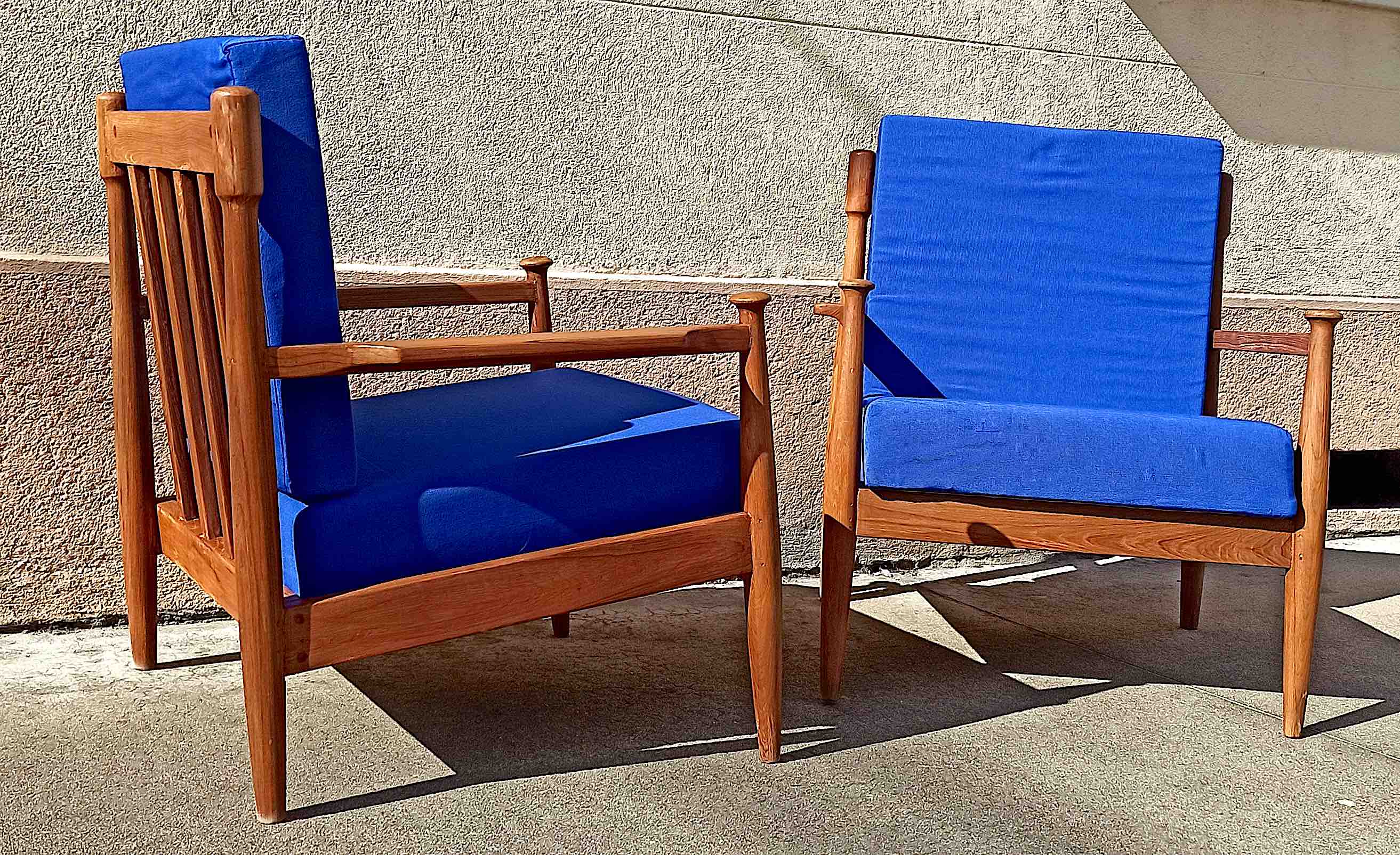Pair of scandinavian armchairs in solid teak 50s