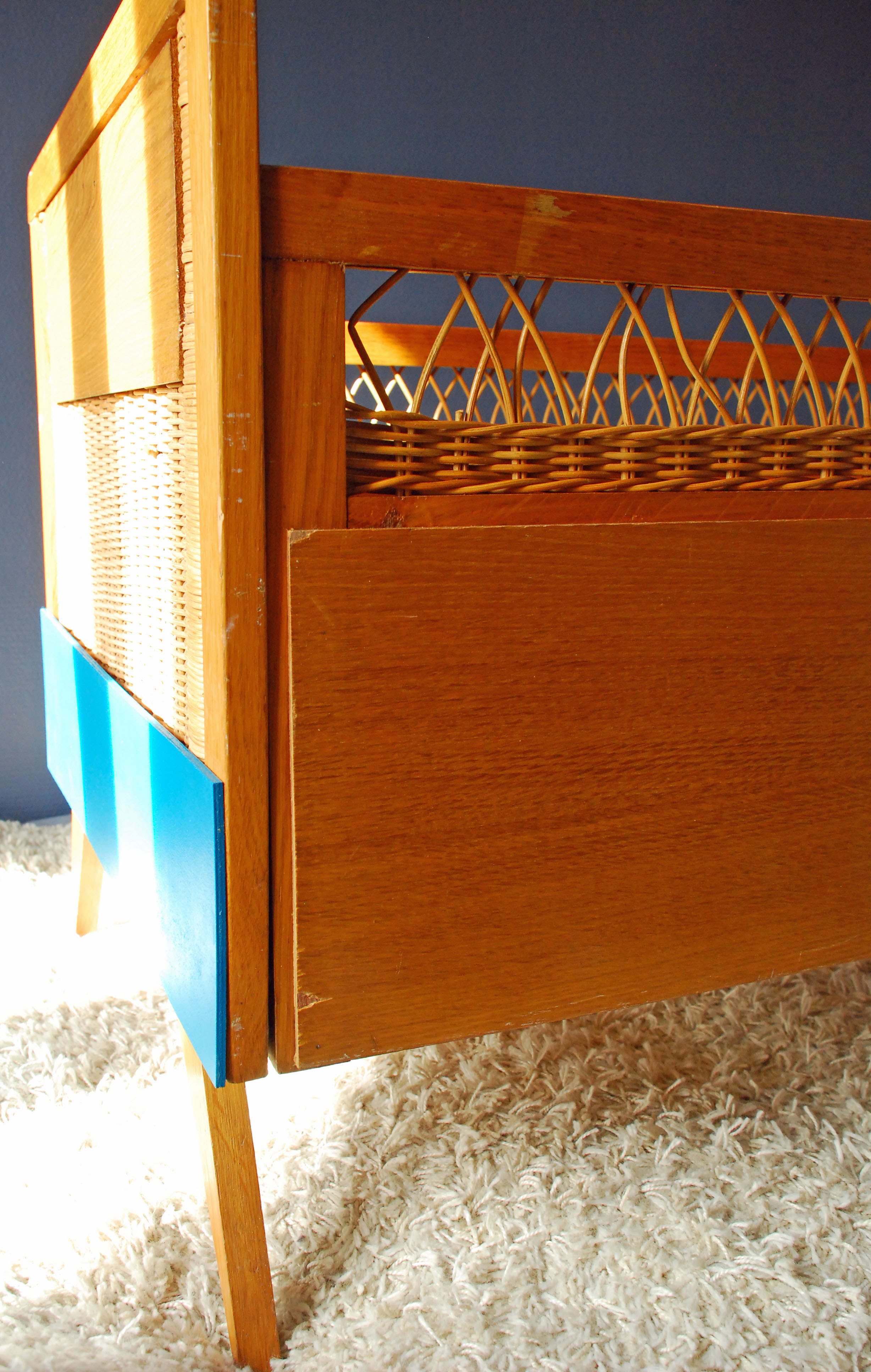 Wooden bed and vintage rattan