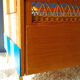 Wooden bed and vintage rattan