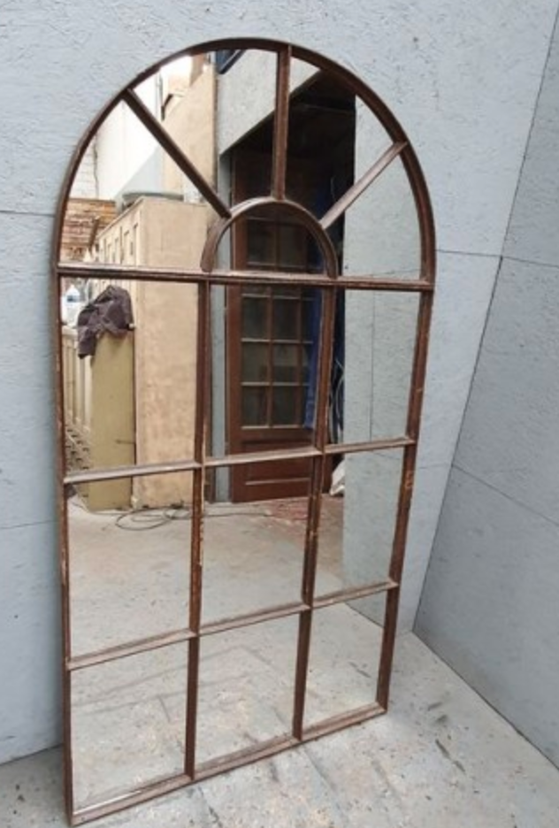 Metal industrial mirror in the shape of a warhead height 156 cm