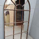 Metal industrial mirror in the shape of a warhead height 156 cm