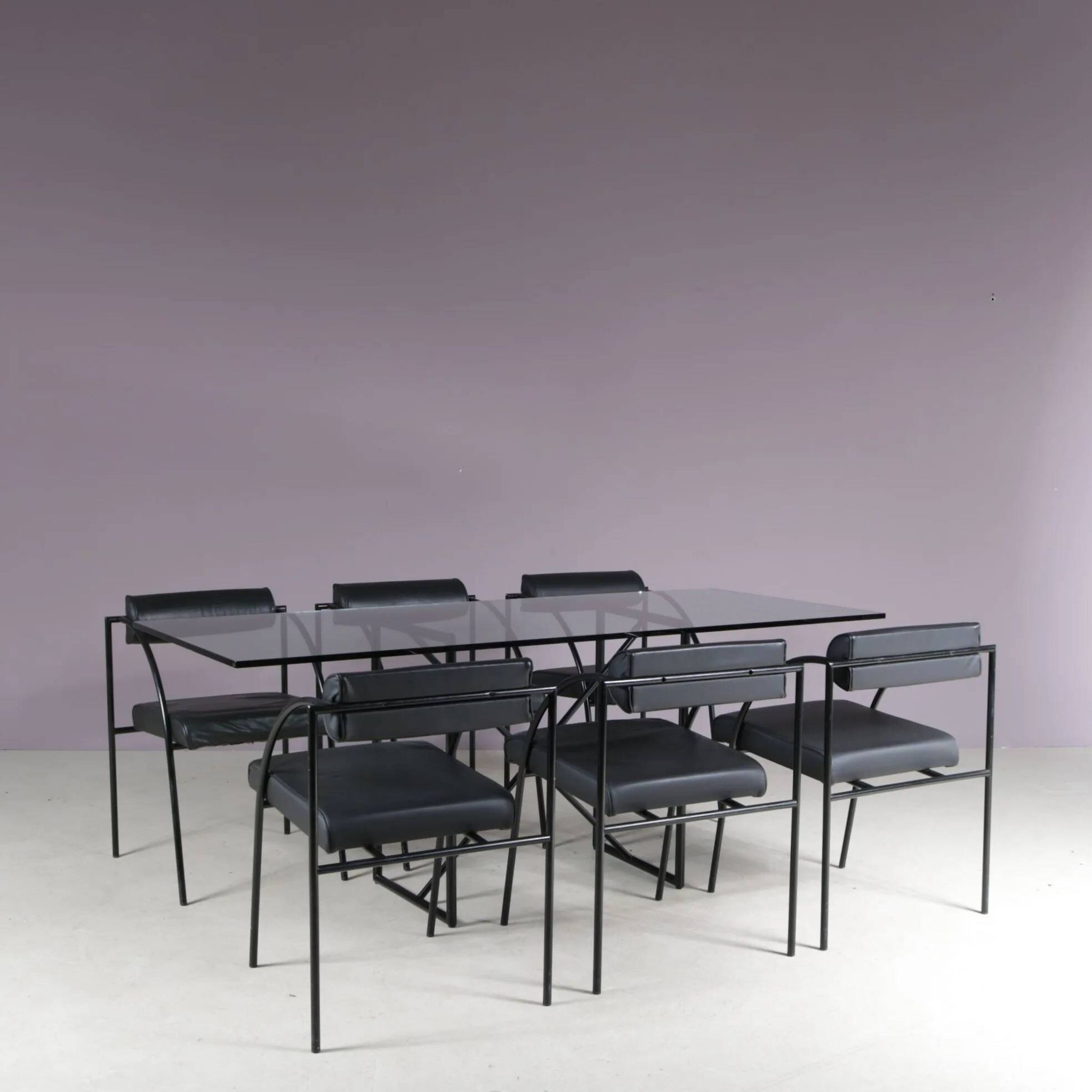 1980s “Tokio” dining table with six “Vienna” chairs by Rodney Kinsman for Bieffeplast, Italy
