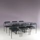 1980s “Tokio” dining table with six “Vienna” chairs by Rodney Kinsman for Bieffeplast, Italy