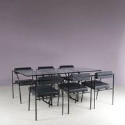 1980s “Tokio” dining table with six “Vienna” chairs by Rodney Kinsman for Bieffeplast, Italy