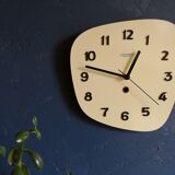 Clock formica vintage asymmetrical silent wall clock "Manufrance pale yellow"