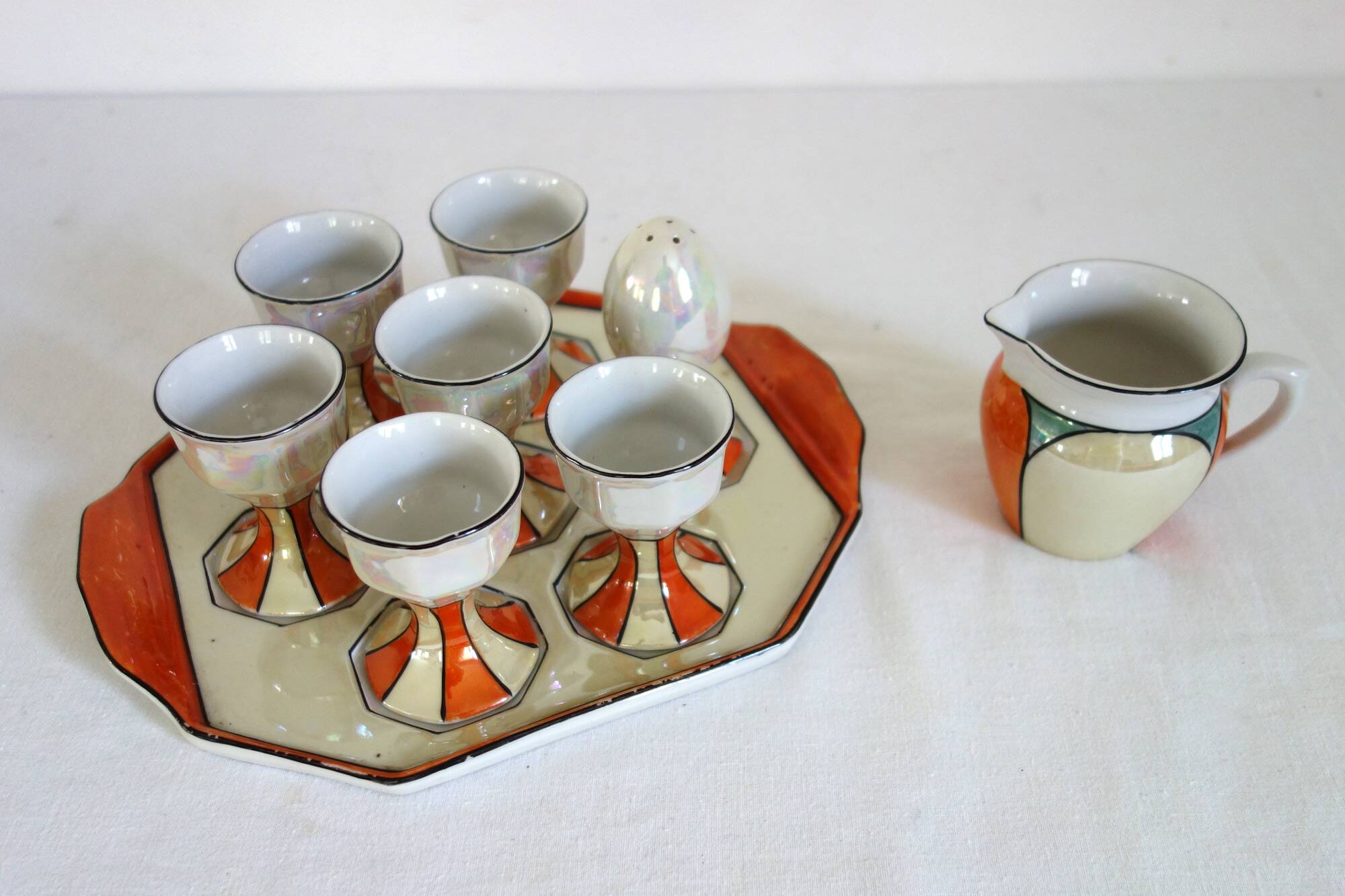Vintage iridescent set of 6 egg cups, salt shaker, tray and pitchers
