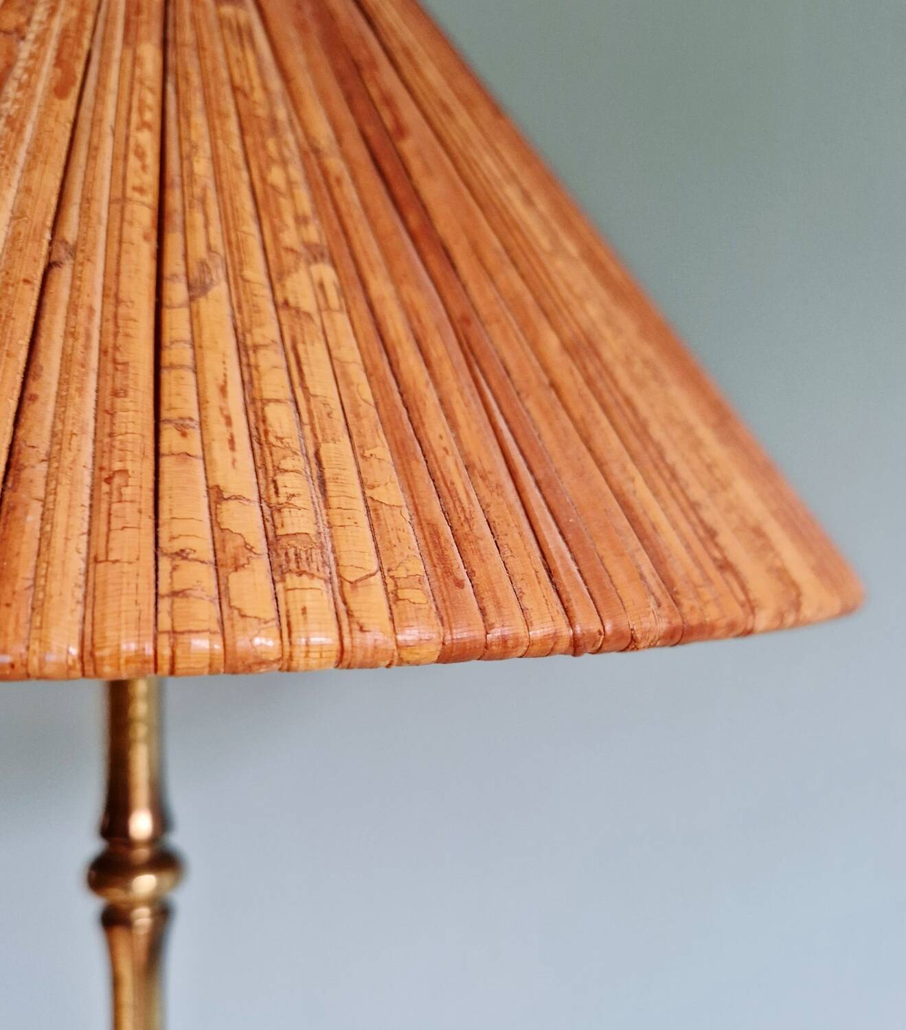Brass floor lamp with rattan shade, 1950s-60s.