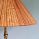 Brass floor lamp with rattan shade, 1950s-60s.