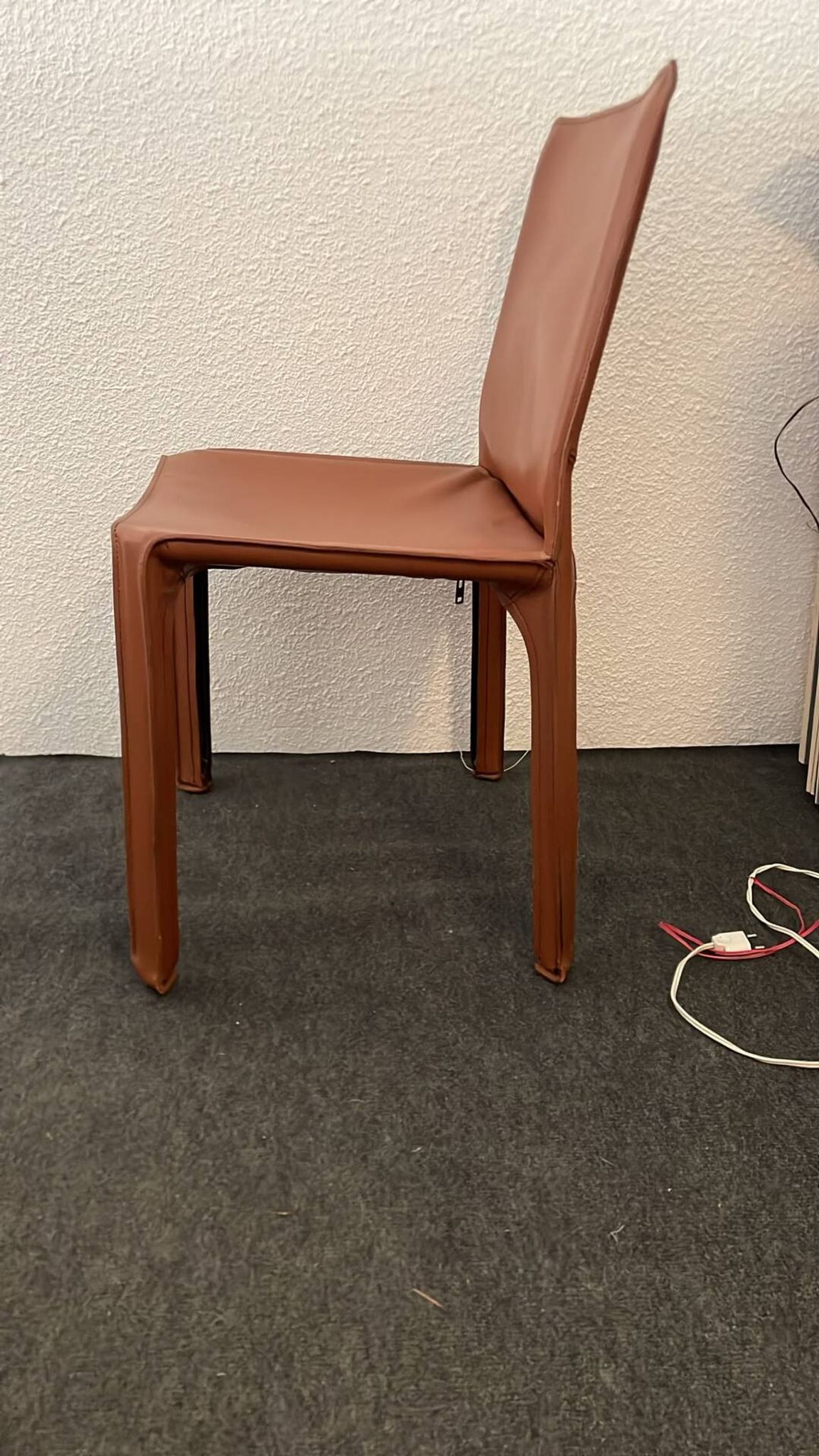 Brown leather zipped chair in Bellini style, Italian design.