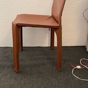 Brown leather zipped chair in Bellini style, Italian design.