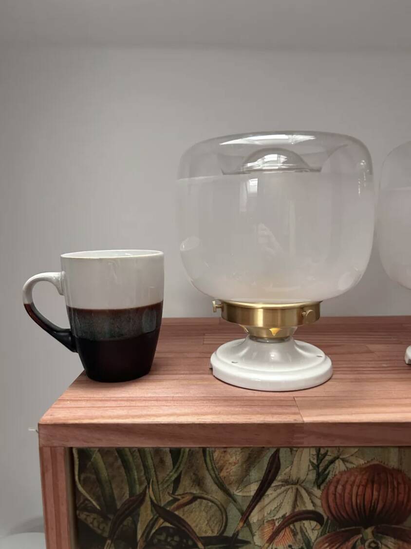 Pair of two-tone globe wall lights