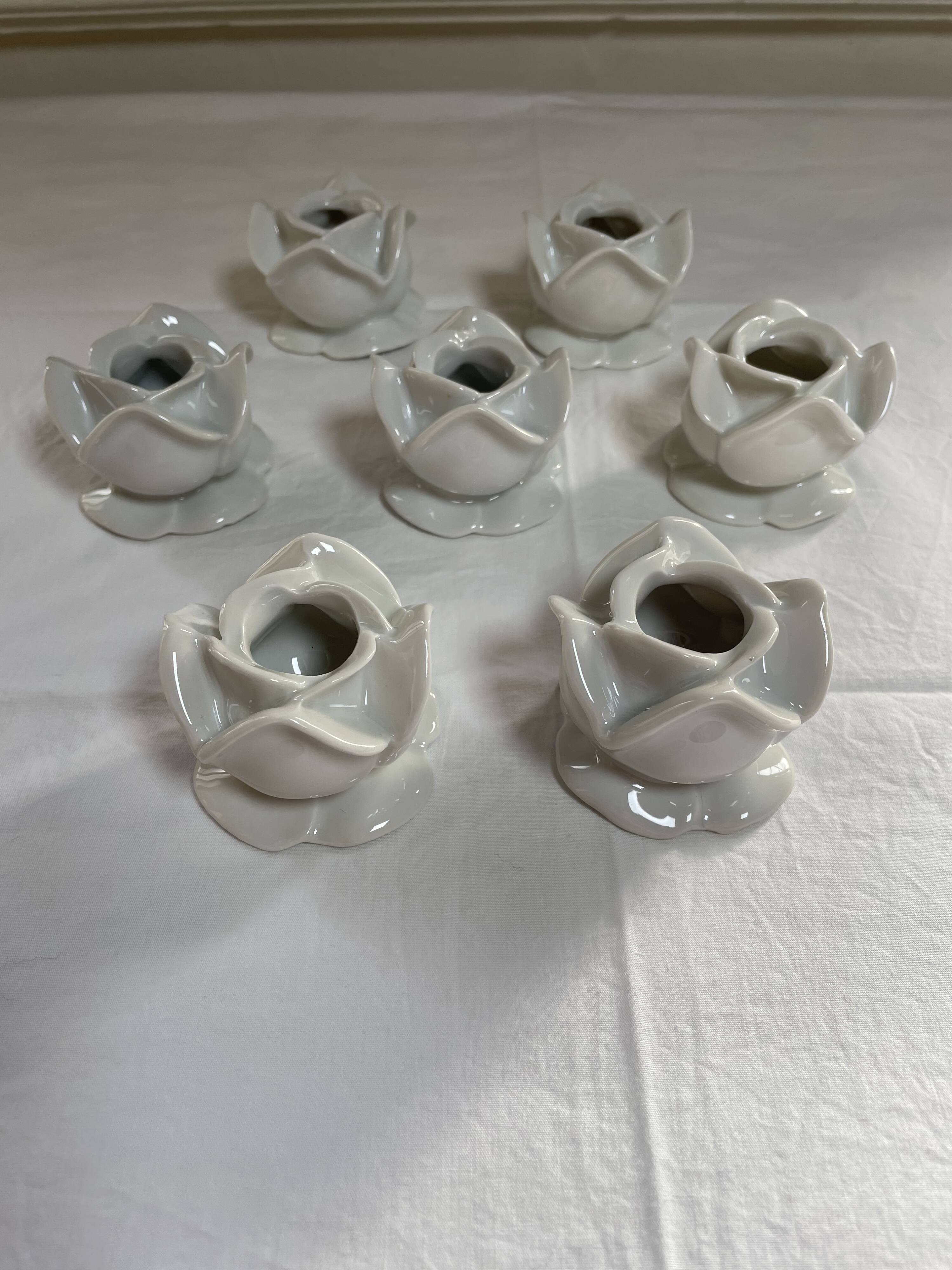 White porcelain rose shaped candle holders