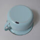 Old green enamelled steel pot cover