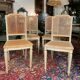 Set of four grey lacquered wooden chairs in the Louis XVI style, late 19th century.